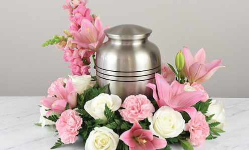 silver urn with flowers